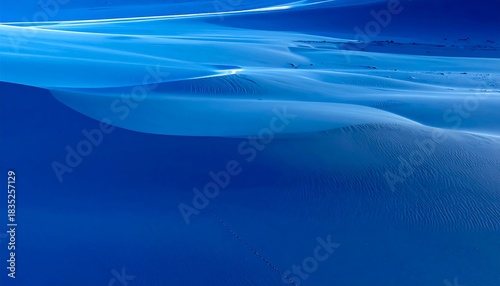 Fototapeta Naklejka Na Ścianę i Meble -  Azure sand dunes in dramatic lighting