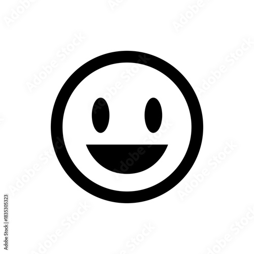 A simple black and white smiley face with oval eyes and a wide curved smile on a white background surface
