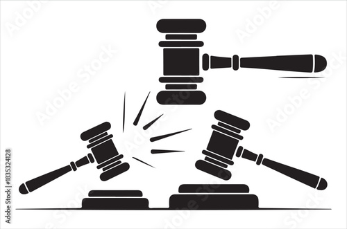 Black silhouette of a gavel striking down symbolizing justice and legal rulings