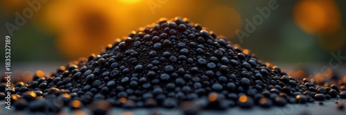 A mound of black oil sunflower seeds, close-up , abundance, botany, macro