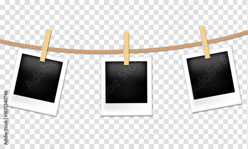 Photo frames hanging on rope with clothespins