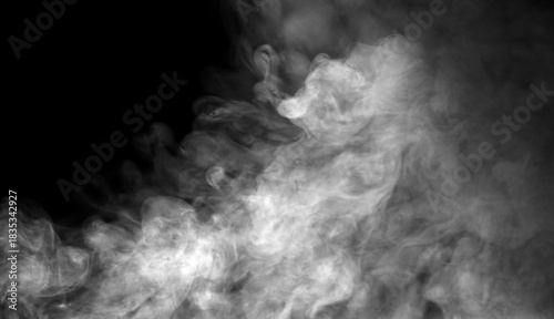 Obraz na plátně Dense white smoke drifting on a dark background creates a dramatic atmospheric texture, ideal for design overlays, cinematic effects, and creative compositions needing mist, fog, or vapor elements