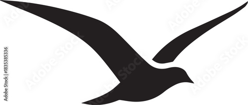 Black silhouette of a flying bird with wings spread