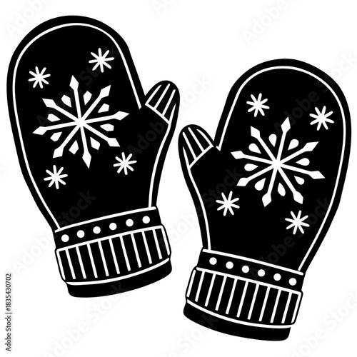 Black and white mittens with snowflake designs