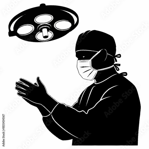 Surgeon in sterile attire preparing for operation under surgical light.