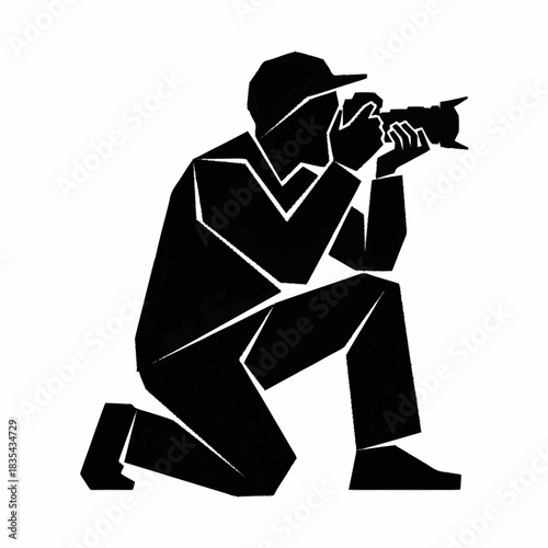 Geometric black silhouette of a kneeling photographer with a camera.