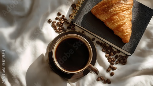 Black Espresso Coffee with Croissant and Coffee Beans Flat Lay