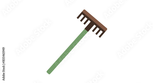 Brown rake with green handle
