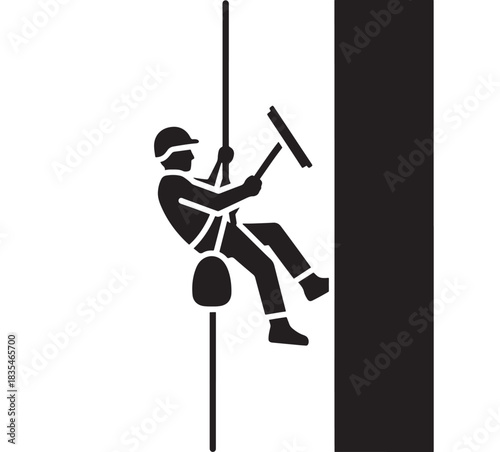 Skilled window cleaner suspended by rope meticulously washing exterior skyscraper glass with squeegee tool for pristine results