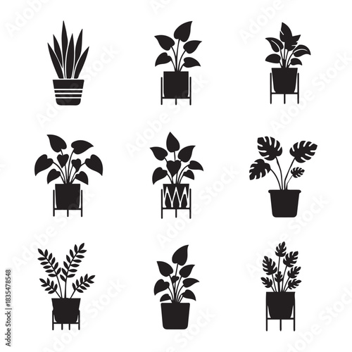 Collection of nine black silhouette potted houseplants in minimalist style on white background