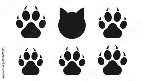 Black silhouette of wolf head and paw prints on white background