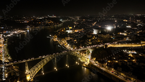 Wallpaper Mural Porto at Night from Drone – Illuminated Riverside, Historic Cityscape, Douro River Lights and Old Town Architecture Captured in Stunning Aerial View. Portugal Aerial Torontodigital.ca