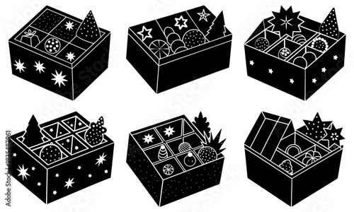 Six black and white boxes filled with christmas ornaments and decorations in various compartments