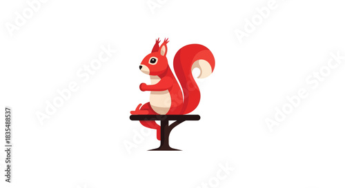 Red squirrel with bushy tail seated on a small black table