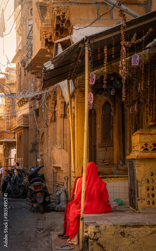 Woman sitting in the street, Jaisalmer, India