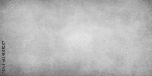 Dark gray brushed metal texture pattern surface with grunge wall backdrop