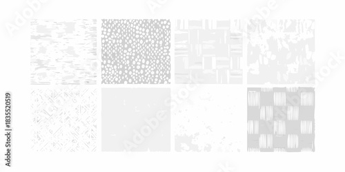 Set of eight gray and white abstract seamless patterns
