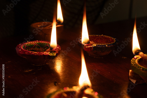 Portrait view of Karthigai deepam colorful oil lamp, a bright lights in the night