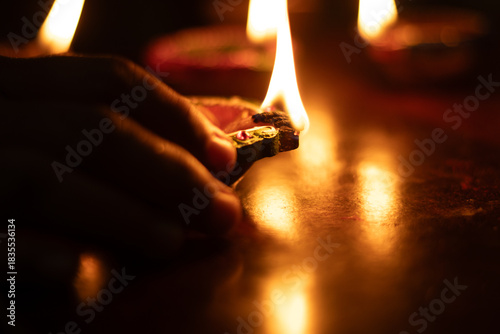 Portrait view of the oil candle light during the Karthigai deepam celebration in Tamil Nadu