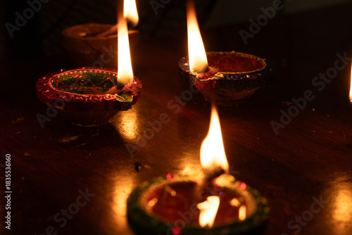 Portrait view of Karthigai deepam colorful oil lamp, a bright lights in the night