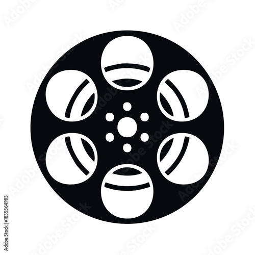 Black and white film reel illustration with round openings for strips, circular shape in center.