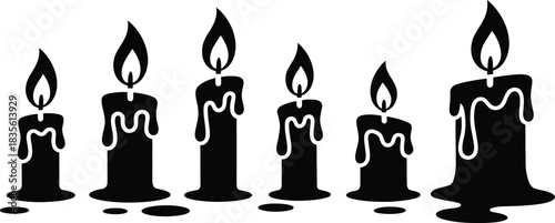 Black and white silhouette of burning candles with dripping wax