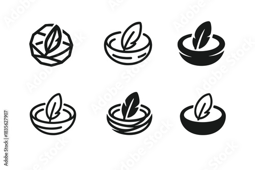 Nest Logo Variations. Nest. Icon set. Set Logo of nest: nest with single feather emblem. harmonious logo variations of the same emblematic concept, each with