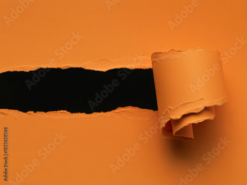 Unveiling hidden depths with vibrant orange torn paper, perfect for dramatic reveals and captivating background designs or announcing big news