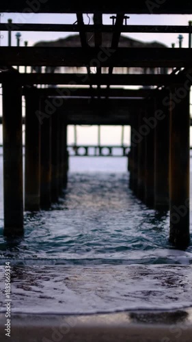Wallpaper Mural Rusty iron pier remains viewed from underneath. Rustic pier framework seen from below. Underneath an abandoned pier skeleton structure. Decayed pier skeleton shot from below in coastal setting. Torontodigital.ca