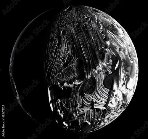 3d render of abstract art of a black and white monochrome surreal mystic ball, sphere, stone, moon, planet with craters and rough damaged surface on a black background 