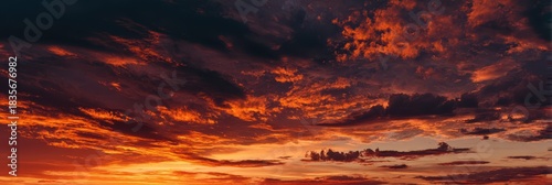 Vibrant Sunset Cloudscape: Dreamy Sky in Red, Orange, and Yellow Hues