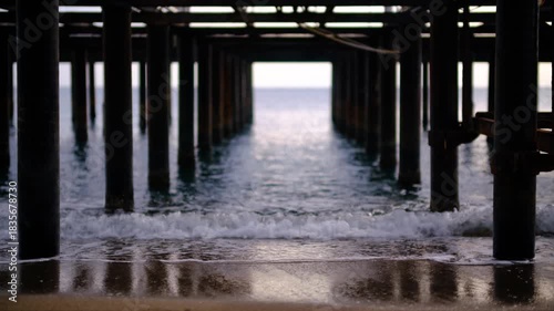 Wallpaper Mural Rusty iron pier remains viewed from underneath. Rustic pier framework seen from below. Underneath an abandoned pier skeleton structure. Decayed pier skeleton shot from below in coastal setting. Torontodigital.ca