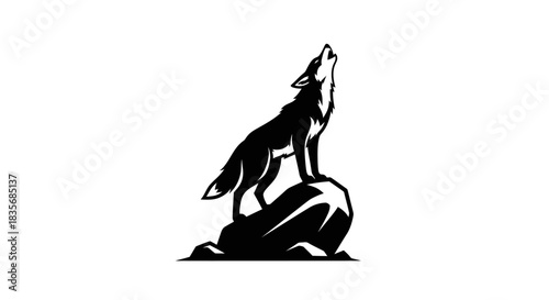 Silhouette of a wolf howling on a rock.