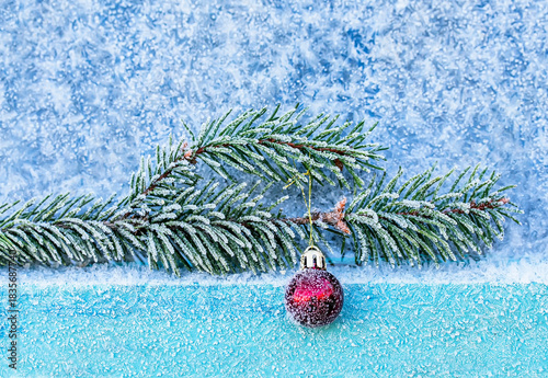 Holiday card with shiny crystals of cold transparent blue hoarfrost covering ...