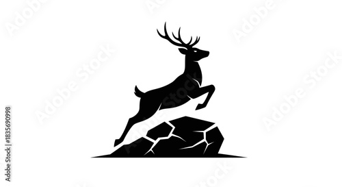 Silhouette of a Majestic Deer Leaping Over Rocks.