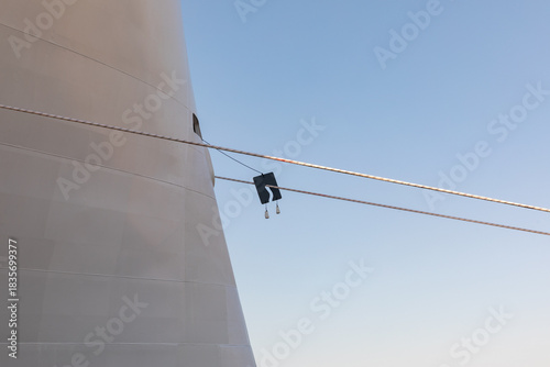 Rat Guards on the Lines and Ropes on the Side of a Cruise Ship at the Pier
