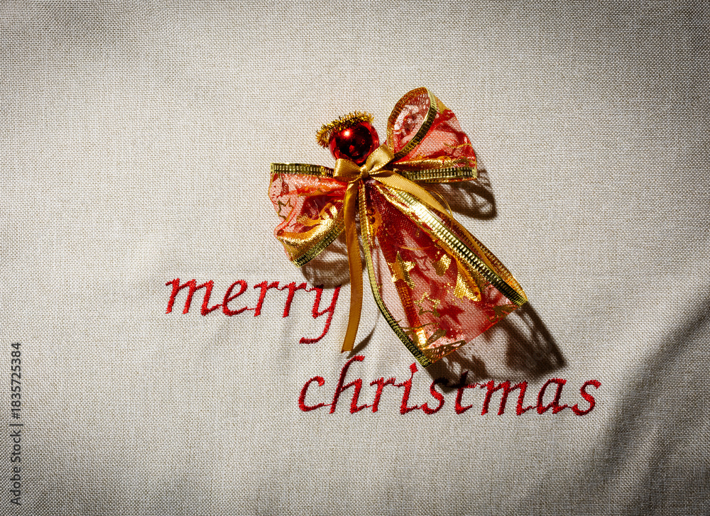 Obraz premium Merry Christmas decoration with angel and ribbon