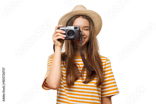 Smiling young girl tourist holding camera, female photographer