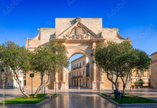 Porta Napoli, an arch of triumph in Lecce, Italy. Built in 1548 in honor of Charles V, it is the main city gate into the old town.