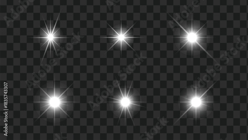 Set of six bright white starburst light flare effects on dark background