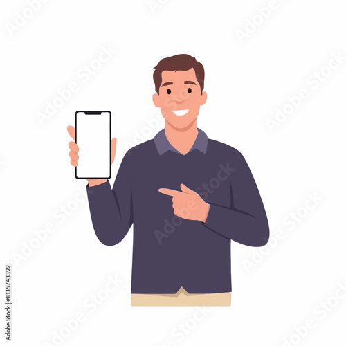 Smiling man presenting blank smartphone screen while standing indoors, showcasing technology with a friendly and approachable demeanor.