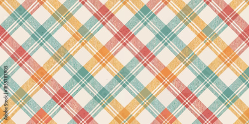 Colorful plaid pattern featuring warm tones and geometric design.