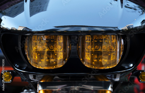 Close-up of the headlights of a vintage motorcycle.