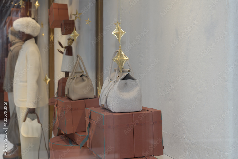 Fototapeta premium display window with mannequins at Loro Piana, a clothing store, located at 111 Bloor St W, Toronto