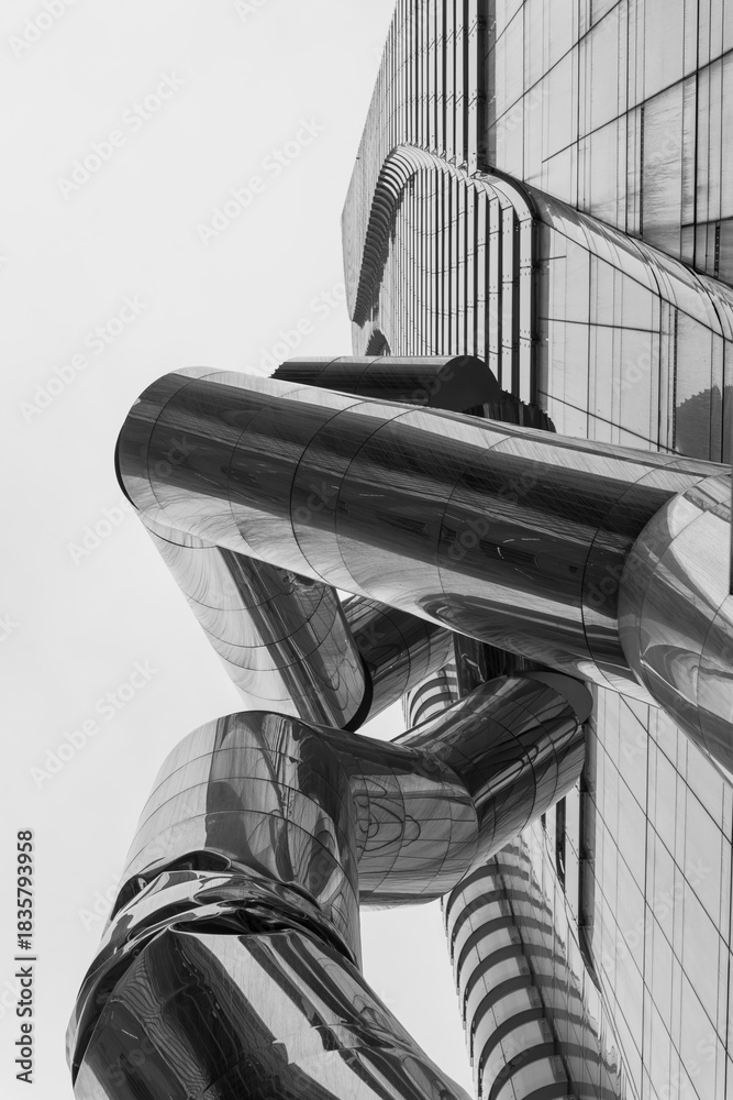Fototapeta premium black and white skyward view of “Safe Hands” by Ron Arad at One Bloor (1 Bloor St E, a condominium complex), Toronto