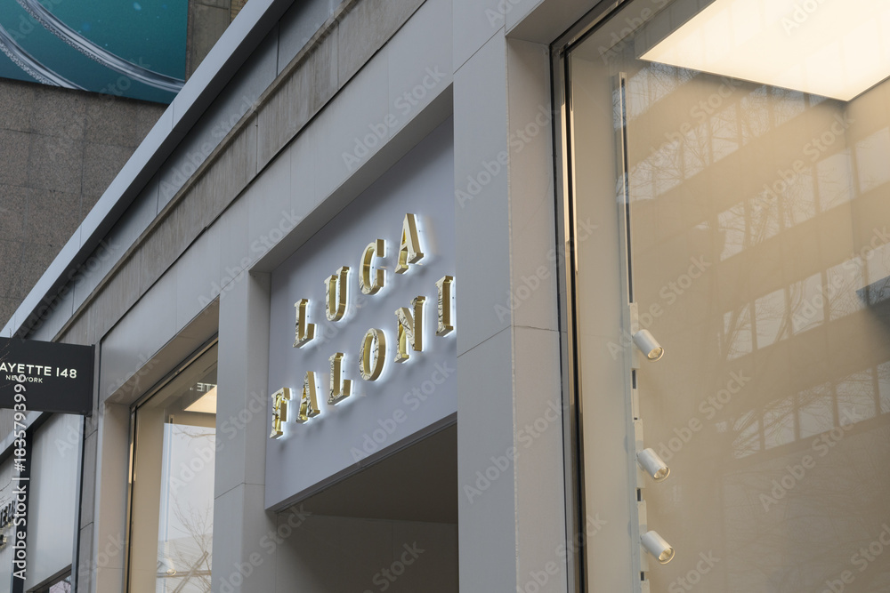 Fototapeta premium exterior building facade and sign of Luca Faloni, a men's clothing store, located at 130 Bloor St W, Unit 115, Toronto
