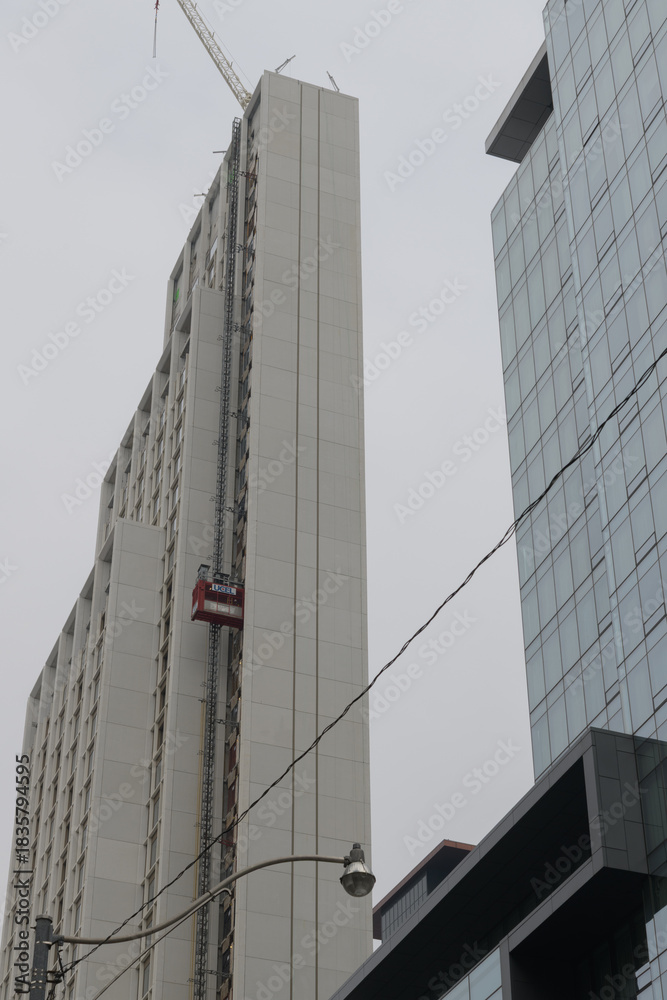 Fototapeta premium skyward view of 50 Scollard Condos (with elevator) designed by Foster + Partners developed by Lanterra, Toronto