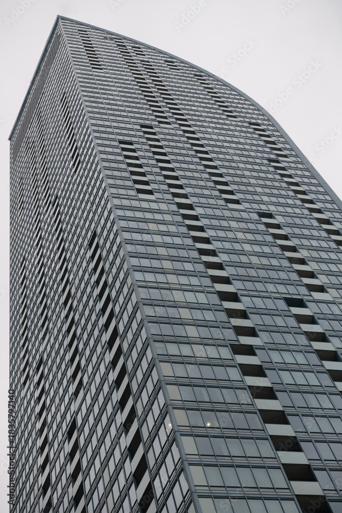 Naklejka premium skyward view of L‑Tower, a residential skyscraper designed by Daniel Libeskind, completed in 2016, located at 8 The Esplanade, Toronto