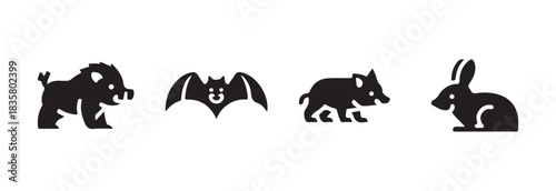 Collection of woodland animals in simple flat black icon style including boar, bat, small boar, and rabbit