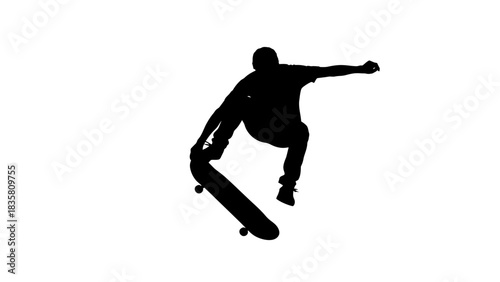 Silhouette of a skateboarder performing a trick in mid-air, showcasing action and skill.